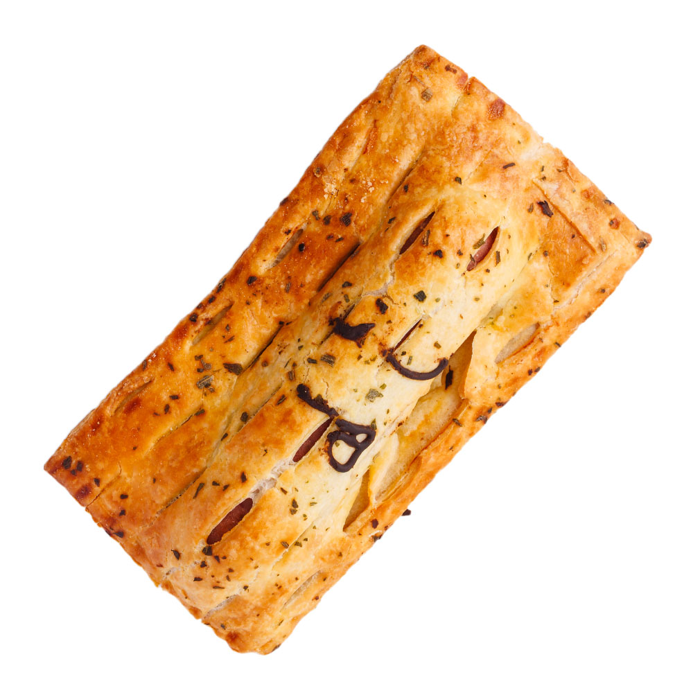 Close-up of a single Pie Face Beef Kransky roll, showing the puff pastry, seasoning, and a small decorative dark line